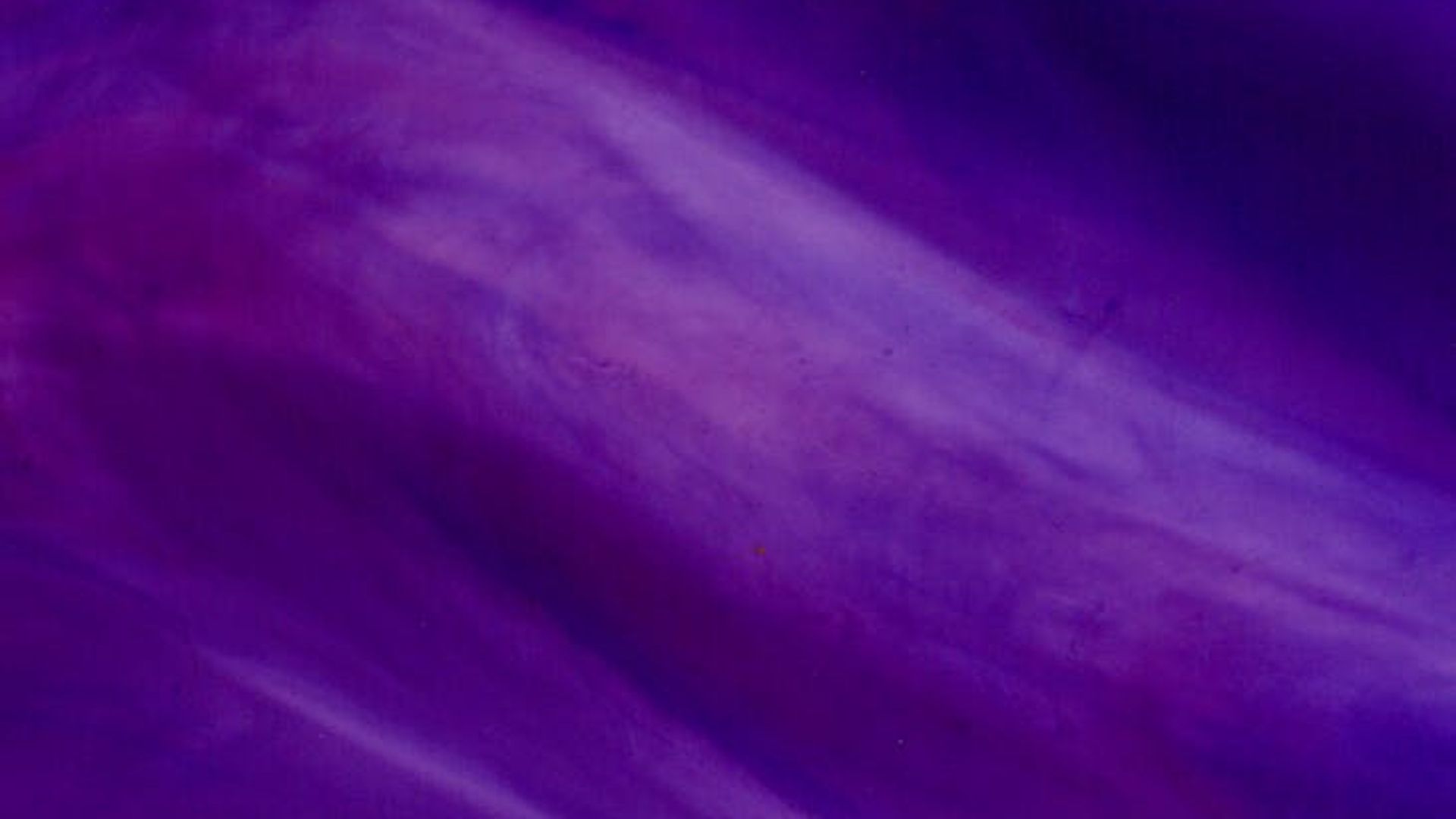 Abstract dark violet background texture.